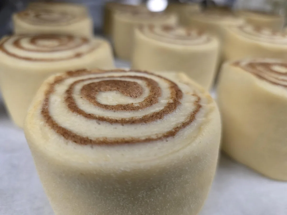 Close-up of the cinnamon swirl inside a homemade cinnamon roll